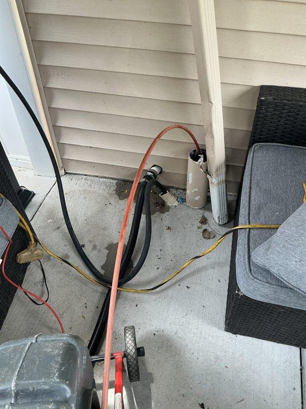 Performed cable and camera inspection of underground plumbing lines to assess condition and identify potential blockages or damage. Deployed specialized sewer camera equipment through exterior access point, documenting findings with photographic evidence of line integrity and flow path.