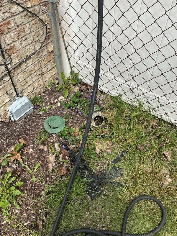 Performed cable and camera inspection of underground plumbing lines to assess condition and identify potential blockages or damage. Deployed specialized sewer camera equipment through exterior access point, documenting findings with photographic evidence of line integrity and flow path.
