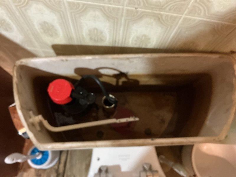 Responded to service call for leaking bathroom sink and slow-draining toilet in downstairs bathroom of 70-year-old home. Upon inspection, identified faulty fill valve assembly in toilet tank causing water overflow and contributing to drainage issues. Replaced deteriorated fill valve components including refill tube connections, adjusted water level settings, and tested flush mechanism for proper operation. Inspected sink drain lines and verified proper water supply connections throughout bathroom. All fixtures restored to normal operation with no active leaks detected at completion.