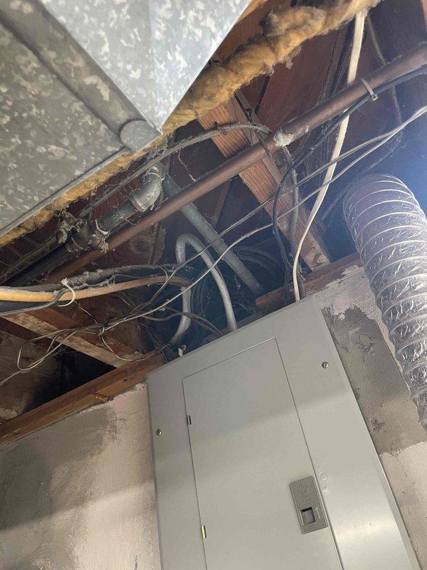 Conducted on-site evaluation for complete HVAC system replacement of 10+ year old air conditioning unit and natural gas furnace. Assessed existing equipment location, documented current system conditions including deteriorated insulation and aging ductwork in utility area, and provided comprehensive estimate for new Lennox comfort system installation.