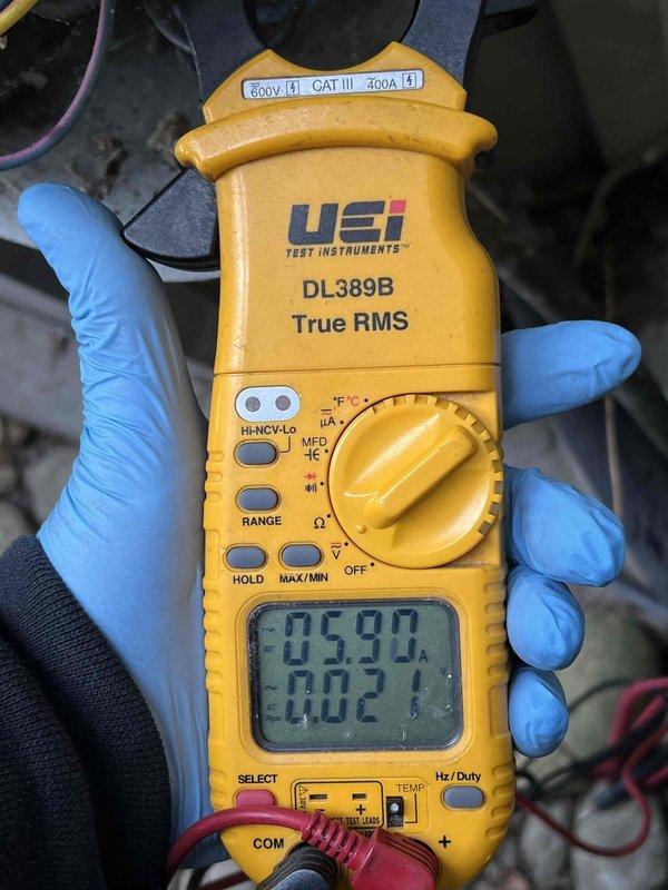 Completed comprehensive Gold AC inspection on 10+ year old single unit system with basement-located air handler. Performed diagnostic testing using calibrated instruments, measuring system pressures at 106.8 psig low side and 157.2 psig high side on R-410A refrigerant. Evaluated system performance metrics including calculated superheat of 11.0°F (target 18.0°F) and subcooling of 8.1°F (target 16.0°F), indicating potential undercharge condition. Verified electrical parameters using True RMS multimeter, documenting amperage draw and voltage readings. System currently operational with homeowner present; documented all findings with diagnostic screenshots for service records.
