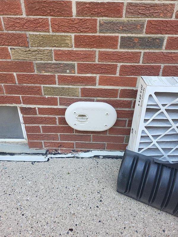 Completed comprehensive HVAC system evaluation on 16-year-old air conditioning system experiencing progressive refrigerant loss over two consecutive years and failing contactor. Performed Gold AC inspection on single-unit residential system with basement-located air handler, documenting exterior condenser unit mounted near brick wall structure and interior mechanical equipment configuration. Provided replacement estimate recommendations based on age of equipment, recurring refrigerant deficiency, and electrical component failure.