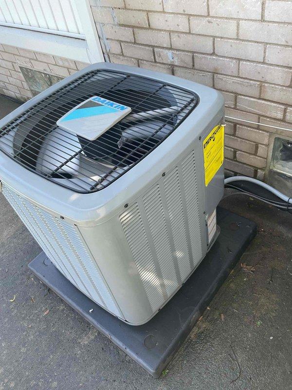 Performed comprehensive tune-up on 6-year-old residential HVAC system with coil located in basement. Inspected outdoor condenser unit and indoor furnace components, verifying proper operation of all mechanical and electrical systems. Documented equipment condition through photographs showing normal wear consistent with age, with all components functioning within manufacturer specifications at time of service.