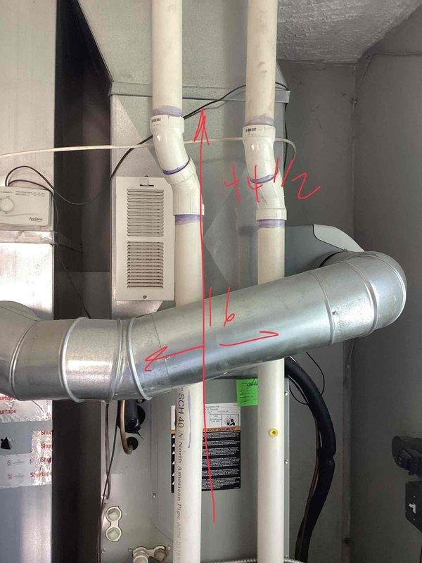 Performed comprehensive estimate inspection on 10+ year old HVAC system following identification of cracked heat exchanger in American Standard furnace unit located in basement mechanical room. Evaluated existing R410A air conditioning system and assessed feasibility of complete system replacement including furnace and AC unit. Documented current equipment configuration, ductwork connections, venting setup with white PVC exhaust/intake pipes, and overall system condition to provide homeowner with replacement options for full HVAC system upgrade.