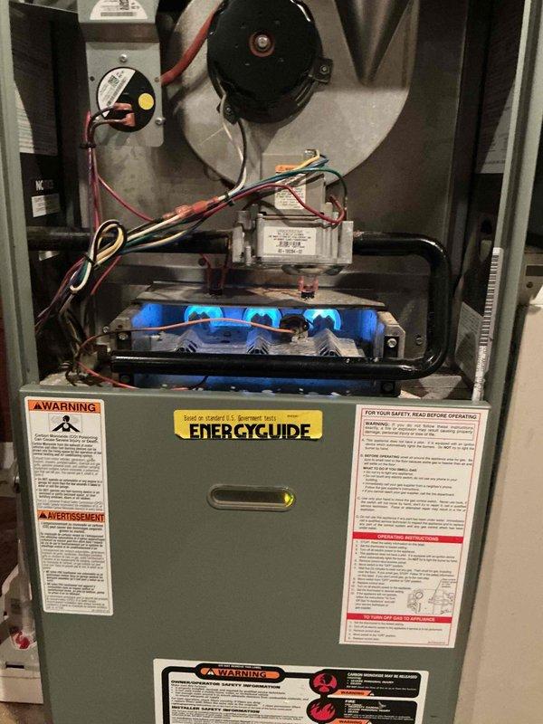 Completed comprehensive tune-up and inspection on three furnace units and three air conditioning systems, all approximately seven years old and located in the basement. Performed diagnostic testing using digital multimeter to verify system performance, including temperature and pressure readings across all units. Observed active condensation on refrigerant lines during AC operation, indicating proper cooling cycle function. Inspected burner assemblies, blower motors, inducer fans, and electrical connections on all furnace units, confirming blue flame combustion and proper ignition sequence. Verified all transformer connections, control modules, and wiring harnesses for secure attachment and absence of damage. All six HVAC systems tested and confirmed operational with no immediate service needs identified.