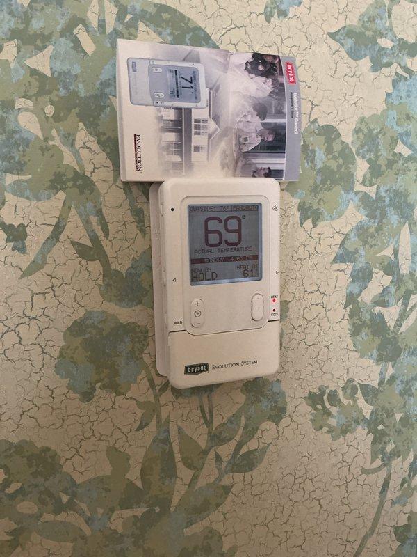 Completed comprehensive Gold AC Inspection on 10+ year old single-unit HVAC system with basement-located air handler. Performed full system evaluation including thermostat functionality check of Bryant Evolution System digital control, verified equipment operational status, and documented existing conditions through photographic records. Inspected furnace unit, associated ductwork, and mechanical components in basement utility area. System confirmed operational at time of inspection with all equipment functioning as designed.