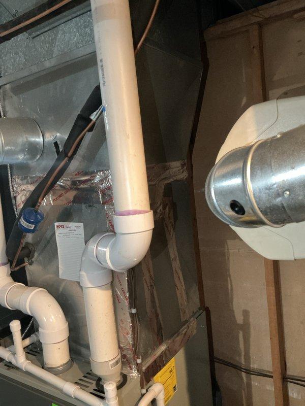 Completed estimate for replacement of two residential air conditioning units, both approximately 20 years old, located in basement. Units were evaluated following discovery of blown fuse during scheduled maintenance visit. Due to age of equipment and homeowner's preference to avoid further repair investments, full system replacement was recommended for both AC units. Assessment included inspection of existing ductwork, condensate drainage systems, and electrical connections visible in basement utility area.
