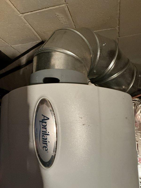 Completed comprehensive tune-up inspection on 5-year-old HVAC system located in basement. Performed thorough evaluation of furnace operation, inspected and tested Hunter brand thermostat for proper functionality and calibration, examined Aprilaire humidifier unit with connected ductwork for optimal performance and water flow, and conducted safety inspection of hot water tank. All components found to be operating within normal parameters with no immediate service needs identified.