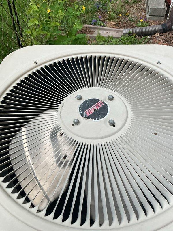 Completed comprehensive tune-up and inspection on 26-year-old air conditioning system with basement-located evaporator coil. Performed standard maintenance procedures including inspection of outdoor condensing unit fan assembly, verification of drain pan condition in crawl space, and assessment of refrigerant lines and connections. Contacted landlord with findings as requested; unit operational at time of service though age of equipment was noted for future consideration.