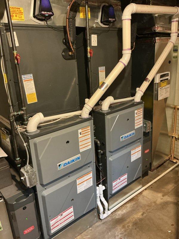 Completed comprehensive preventive maintenance service on dual Daikin HVAC systems and 24kW Honeywell generator at residential property. Performed full tune-up procedures on both 3-year-old air conditioning units including filter inspection, refrigerant level verification, electrical connection testing, condensate drain line evaluation, and airflow assessment. Inspected and verified proper operation of REME-HALO air purification system integrated into ductwork. Conducted generator maintenance protocol including oil level check, battery inspection, control panel diagnostics, and operational testing. All equipment found operating within manufacturer specifications with no deficiencies noted. White PVC drainage systems and flexible ductwork confirmed properly secured and functioning. All safety labels and warning stickers verified in place and legible.