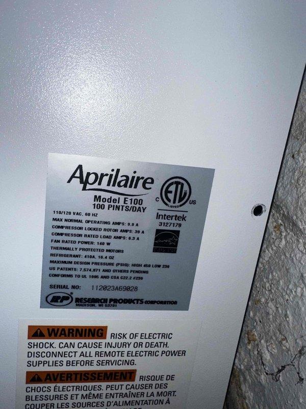 Responded to service call for AprilAire Model E100 whole-home dehumidifier displaying E4 error code and failing to maintain operation after startup. Inspected unit in basement, documented equipment condition and manufacturer specifications. Low temperature sensor/frost sensor identified as required component for repair, with part to be supplied under existing purchase order for future installation.