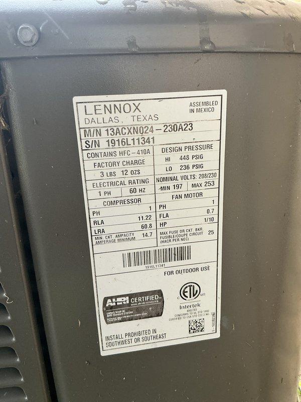 Performed preventive maintenance tune-up on a 9-year-old Lennox AC unit, model 13ACXN024-230A23. System was operational upon arrival and located in exterior side yard on concrete pad. Conducted comprehensive inspection of outdoor condensing unit, verified proper electrical connections at disconnect and meter panel, and documented equipment nameplate specifications including refrigerant charge of HFC-410A at 3 lbs 12 oz. Unit tested and confirmed in proper working condition following tune-up procedures.