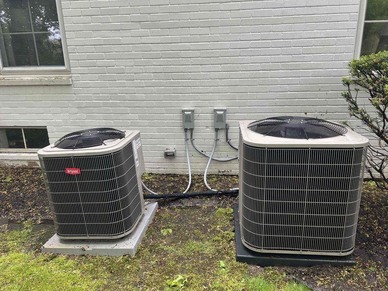 Completed comprehensive tune-up service on dual 12-year-old residential air conditioning systems. Performed standard maintenance procedures on both outdoor condensing units including coil cleaning, refrigerant level verification, electrical connection inspection, and operational testing. Inspected control board components, verified proper communication between system controls, and confirmed all safety switches and relays functioning correctly. Both systems operating within manufacturer specifications with no immediate repairs required.