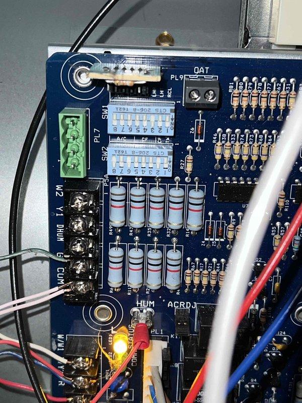 Completed comprehensive tune-up service on dual 12-year-old residential air conditioning systems. Performed standard maintenance procedures on both outdoor condensing units including coil cleaning, refrigerant level verification, electrical connection inspection, and operational testing. Inspected control board components, verified proper communication between system controls, and confirmed all safety switches and relays functioning correctly. Both systems operating within manufacturer specifications with no immediate repairs required.