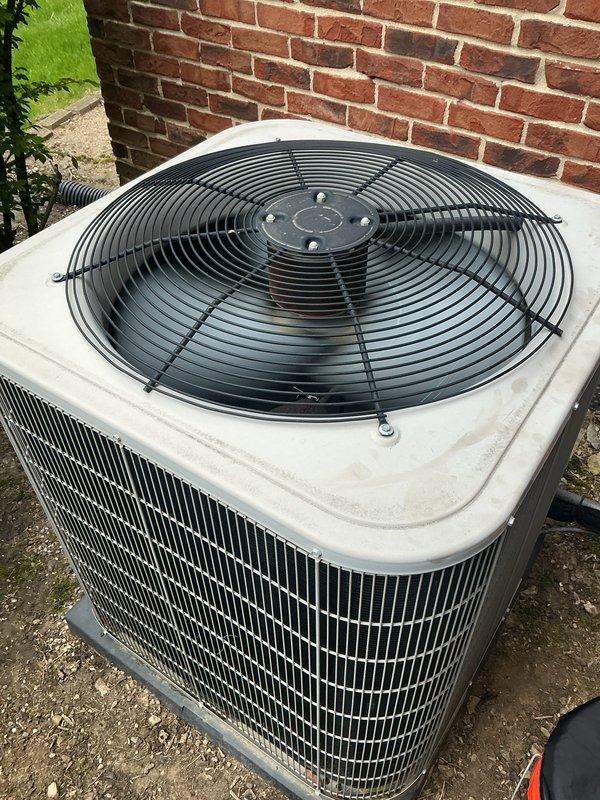 Completed comprehensive Gold AC inspection and preventative maintenance on outdoor condensing unit. Performed full system evaluation including refrigerant charge verification (R410A system operating at proper levels), electrical component testing, compressor amperage readings, and fan motor operation check. Cleaned condenser coils, inspected all electrical connections for proper tightness and signs of wear, verified proper airflow through louvers and fan assembly, and confirmed unit specifications against manufacturer nameplate data. All components found operating within normal parameters. System ready for cooling season operation.