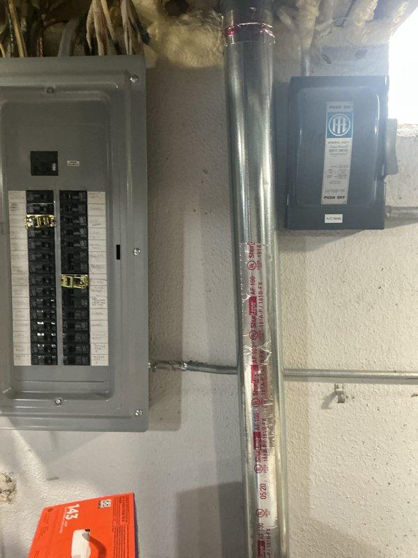Completed full HVAC system installation including 90,000 BTU furnace and 3.5-ton air conditioning unit with rear discharge configuration. Obtained mechanical and electrical permits, installed new electrical disconnect and circuit protection at panel, ran conduit for power supply, and connected all components to code. Installed Sensi digital thermostat, verified proper system operation, and completed utility rebate documentation for Consumers Energy and DTE Energy programs with AHRI certificate number 21558593.