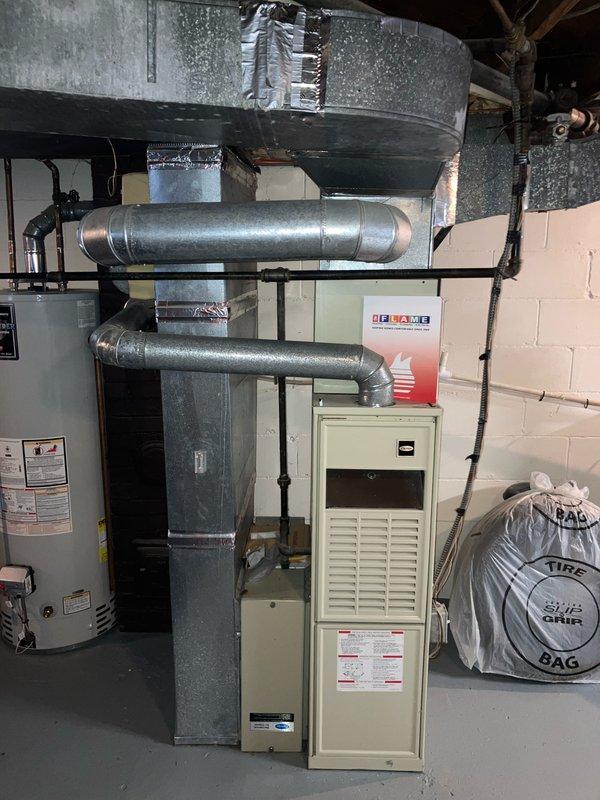 Provided estimate for replacement of 30-year-old non-functioning natural gas furnace located in basement. Assessed existing equipment configuration including ductwork connections, thermostat controls, and utility room layout to determine proper replacement specifications and installation requirements.