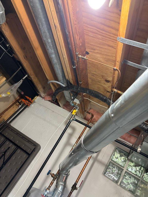 Completed full HVAC system installation including 110,000 BTU Lennox furnace, 4-ton air conditioning unit positioned on right side of property, and complete zone control system with S40 thermostat, 600M zone panel, and circulation pump. Installation included all necessary ductwork modifications, PVC intake and exhaust venting for high-efficiency furnace operation, electrical connections and disconnects, refrigerant lines, condensate drainage, and system integration with existing infrastructure. Obtained mechanical and electrical permits, verified proper airflow and zone damper operation, performed startup procedures, confirmed AHRI certification match (215886497), completed utility rebate documentation for energy-efficient equipment, and ensured all components met manufacturer specifications and local code requirements.