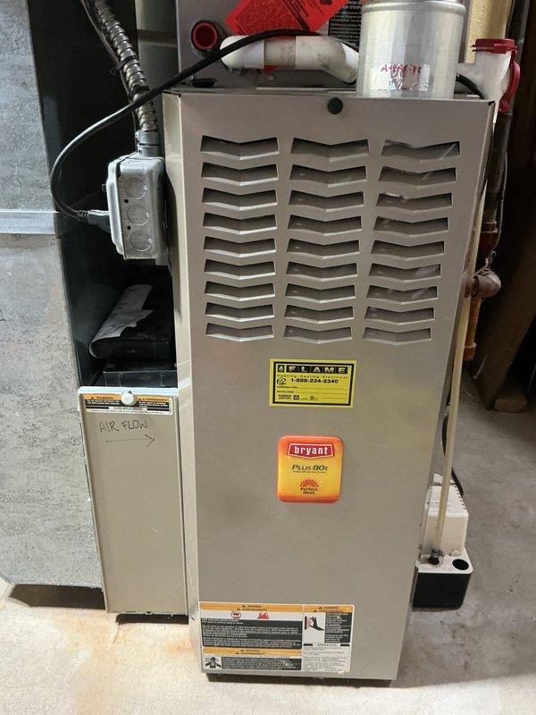 Provided estimate for furnace replacement after diagnosing a cracked heat exchanger in a 2004 Bryant Plus 80t furnace unit located in basement. Additionally performed routine air conditioning maintenance check on 10-year-old AC system in backyard, confirming no system issues present.