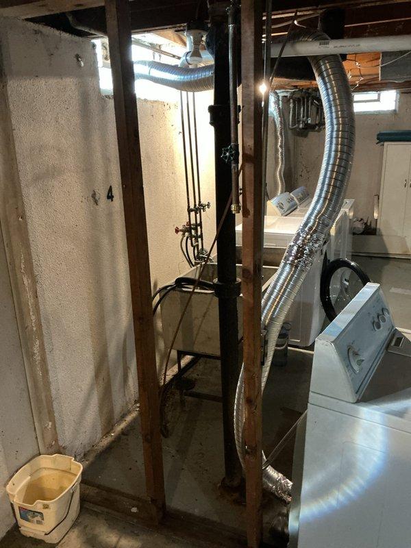 Responded to service call for dryer vent replacement in residential basement utility area. Upon arrival, performed diagnostic assessment of existing ventilation system and identified deteriorated flexible aluminum ductwork requiring replacement. Disconnected old dryer vent ducting from appliance connection point and removed compromised sections. Installed new code-compliant flexible aluminum duct, ensuring proper diameter and secure connections at both the dryer exhaust outlet and exterior termination point. Verified adequate airflow, checked all connections for proper sealing to prevent lint accumulation and moisture infiltration, and confirmed vent routing minimized bends for optimal efficiency. Tested dryer operation to ensure proper ventilation function. Cleared work area and removed all debris from premises.