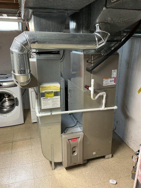 Completed comprehensive Gold AC inspection on 16-year-old residential HVAC system with equipment located in basement utility area. Performed thorough evaluation of gas furnace unit, ductwork connections, and Bryant Evolution System thermostat to ensure optimal performance and safety compliance. Verified all system components operational, documented equipment condition with photos, and renewed Gold Plan maintenance agreement while on site.