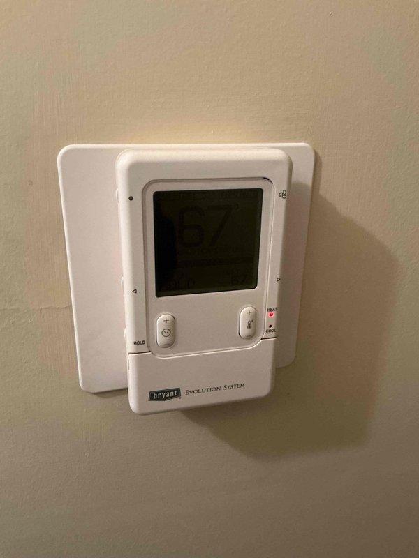 Completed comprehensive Gold AC inspection on 16-year-old residential HVAC system with equipment located in basement utility area. Performed thorough evaluation of gas furnace unit, ductwork connections, and Bryant Evolution System thermostat to ensure optimal performance and safety compliance. Verified all system components operational, documented equipment condition with photos, and renewed Gold Plan maintenance agreement while on site.