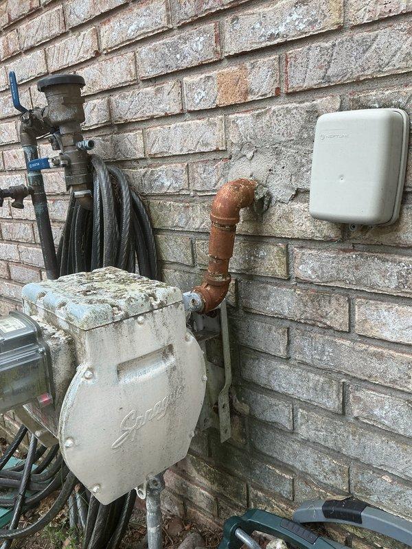 Conducted on-site assessment for new gas line installation at residential property. Evaluated existing utility infrastructure including outdoor plumbing connections, gas meter location, and potential routing paths along exterior brick wall. Documented current conditions of mechanical equipment area, identified optimal placement for new gas line run, and provided comprehensive quote for installation work. Photographed existing utility setup and proposed installation area for project planning purposes.