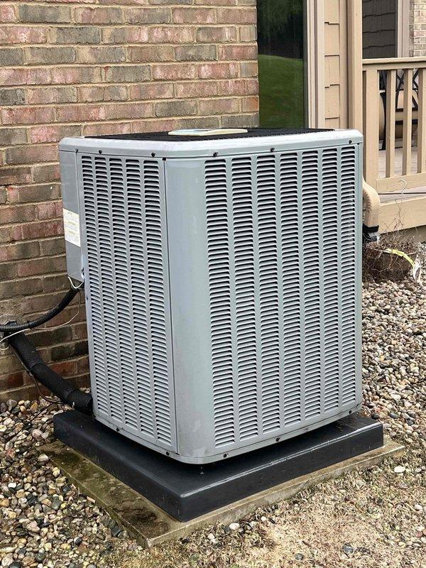 Completed comprehensive AC tune-up and inspection on residential cooling system manufactured in 2018. Unit located on exterior pad with air handler/coil assembly in basement, both operating normally at time of service. Performed standard preventive maintenance procedures including system performance verification, visual inspection of outdoor condenser unit and refrigerant lines, and confirmed proper operation of all components.