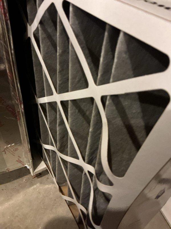 Completed comprehensive Gold AC Inspection on 12-year-old Lennox HVAC system located in basement. Performed full system evaluation including inspection of air handler, evaporator coil, condensate drainage, electrical connections, and refrigerant lines. Examined and documented air filter condition, noting pleated filter media with accumulated dust and particulate matter requiring replacement. Verified proper operation of all system components, checked airflow, and confirmed equipment is functioning within normal parameters. System operational and homeowner advised of maintenance findings.