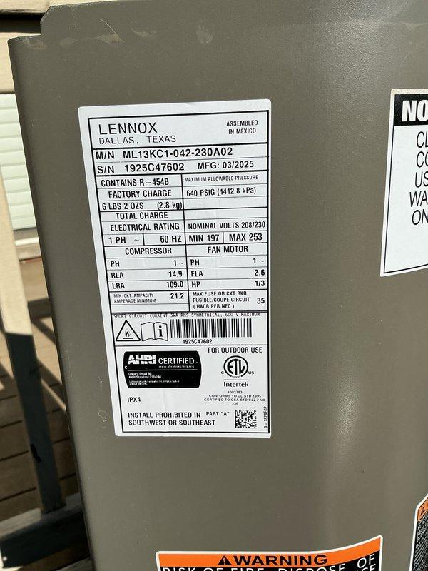 Completed non-service plan air conditioning inspection on Lennox model ML13KC1-042-230A02 condenser unit located at exterior of property. Unit manufactured in March 2025 utilizes R-454B refrigerant and operates on 208/230V single-phase power. Performed visual inspection of outdoor condenser, confirming unit is properly positioned on ground surface adjacent to deck structure with adequate clearance for airflow. Verified condenser coil condition, fan grille assembly, and external cabinet integrity showing no visible damage, excessive wear, or debris accumulation. Checked manufacturer data plate for proper identification and specifications. Unit appears to be operating within normal parameters with no immediate service concerns identified at time of inspection. Documented equipment condition with photographs for service records.
