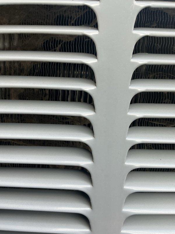 Completed comprehensive Gold AC inspection on 6-year-old Daikin DX18MSUAH system with air handler located in basement. Inspected outdoor condenser unit and indoor air handler/coil assembly, verified all components operating within normal parameters, and documented equipment condition with photographic records. Advised customer to maintain clear area around condenser unit free of debris and animal waste for optimal system performance.
