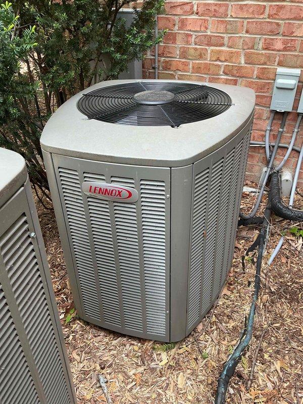 Completed comprehensive Gold AC inspection on residential property with three Lennox condenser units over 10 years old and air handler located in basement. Performed thorough visual inspection of outdoor equipment, verified operational status of all systems, checked refrigerant line connections and electrical conduit mounting, and documented equipment condition with photos showing units in functional condition with minor surface wear on cabinets and fan assemblies intact.