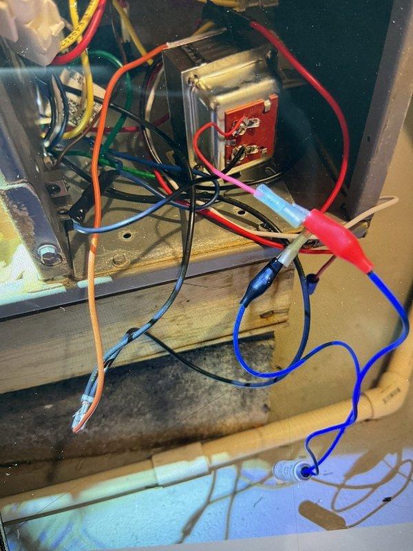 Responded to no cooling call where air conditioning system failed to turn on after operating normally several weeks prior. Upon inspection of the basement air handler, discovered faulty low-voltage transformer preventing proper system operation. Replaced defective transformer, verified all electrical connections at the control board and terminal strip, tested system functionality, and confirmed proper operation of both the indoor air handler and outdoor condensing unit.