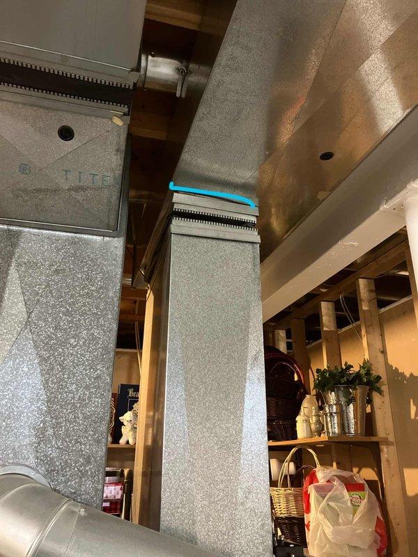 Performed comprehensive diagnostic evaluation on non-operational 14-year-old Bryant furnace system located in basement. Identified multiple critical component failures including oil-leaking blower motor, seized inducer motor causing grinding and squeaking noises, and cracked heat exchanger. Documented existing HVAC installation with vertical ductwork system and provided furnace replacement estimate to address safety concerns and restore heating functionality.