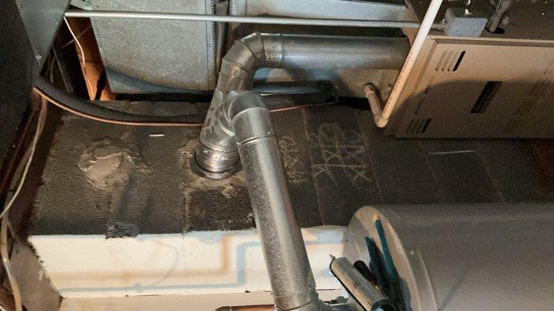 Responded to service call for wind-damaged furnace venting system. Performed diagnostic evaluation of over 10-year-old furnace unit located in basement and assessed compromised vent piping from furnace to chimney termination. Replaced damaged B-vent connector pipe and ductwork sections that had sustained weather-related deterioration, ensuring proper draft and safe exhaust ventilation. Verified all connections were secure, tested system operation, and confirmed compliance with venting standards for continued safe furnace operation.