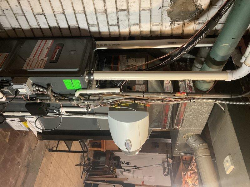 Responded to service call for gas line evaluation in residential basement where four gas leaks had been previously identified. Performed comprehensive visual inspection of gas piping system throughout unfinished basement area, including exposed gas lines running along concrete block walls and connections near water heater and HVAC equipment. Conducted pressure test on gas distribution system to verify leak locations and assess overall system integrity. Documented existing gas line configuration, including black iron pipe routing, fittings, and connection points to appliances. Evaluated condition of gas piping infrastructure, noting age, installation methods, and accessibility for potential repair work. Photographed gas line installation and mechanical room layout for estimation purposes. Identified compromised sections of gas piping requiring attention to restore system to safe operating condition. Provided homeowner with detailed assessment of gas line system and discussed options for