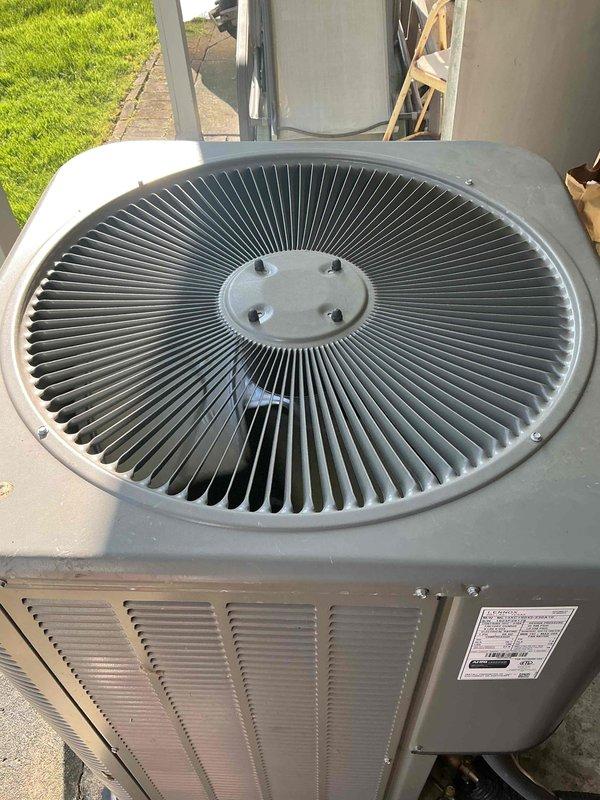 Completed routine pre-season inspection on a 3-year-old Lennox ML14XC1S042 outdoor condensing unit containing R-410A refrigerant. Unit was visually inspected and found in good operational condition with no visible damage, debris accumulation, or refrigerant leaks. All exterior components including fan guard, louvers, and manufacturer data plate were intact and legible. System confirmed ready for cooling season operation.