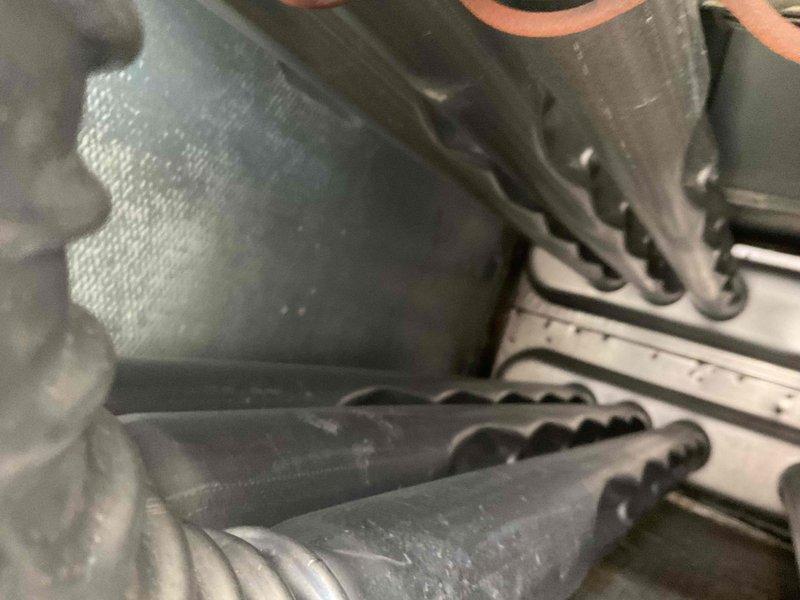Performed preventive maintenance inspection on two rooftop units as part of commercial HVAC maintenance agreement. Accessed equipment using ladder, conducted thorough examination of ductwork connections, flexible duct components, and associated mechanical systems. Documented equipment condition with photographs showing ductwork integrity, insulation status, and overall system operation; all components found in normal working condition with typical wear patterns.