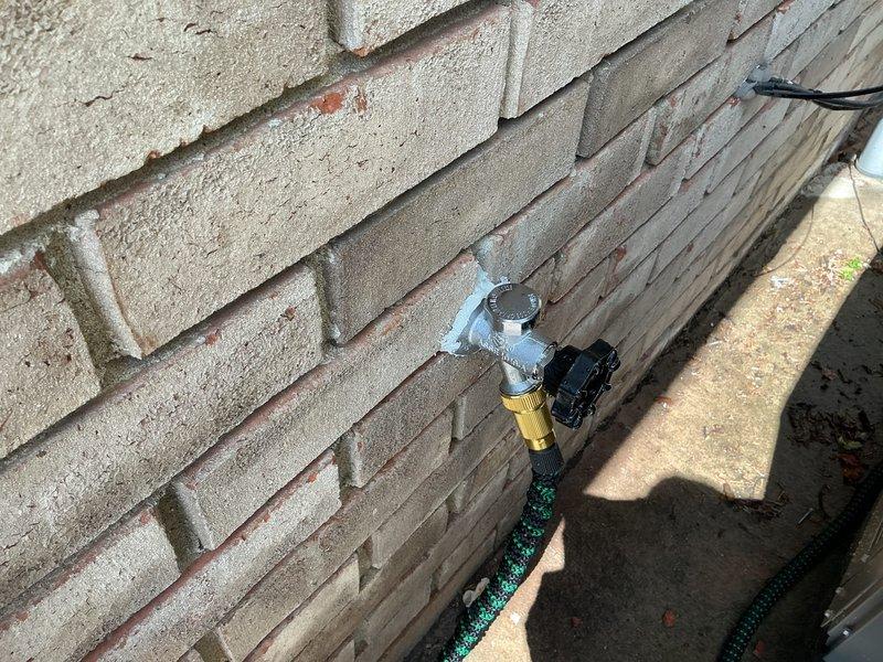 # Outdoor Spigot Replacement

Replaced two exterior hose bibs mounted on brick wall surfaces. Removed existing worn spigots and installed new frost-free sillcocks with brass adapters and shutoff valves. Addressed compromised mounting points on weathered masonry by securing fixtures with appropriate anchoring hardware. Verified proper water flow, tested for leaks at all connection points, and confirmed operational functionality of both replacement units. All plumbing connections sealed and secured to prevent future water intrusion.