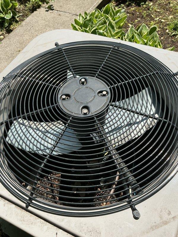 Completed comprehensive NSP AC inspection on 5-year-old basement coil system. Inspected outdoor condenser unit and confirmed proper fan operation, assessed exterior electrical connections and utility installations, and verified system functionality. All equipment operating within normal parameters with no immediate service needs identified.