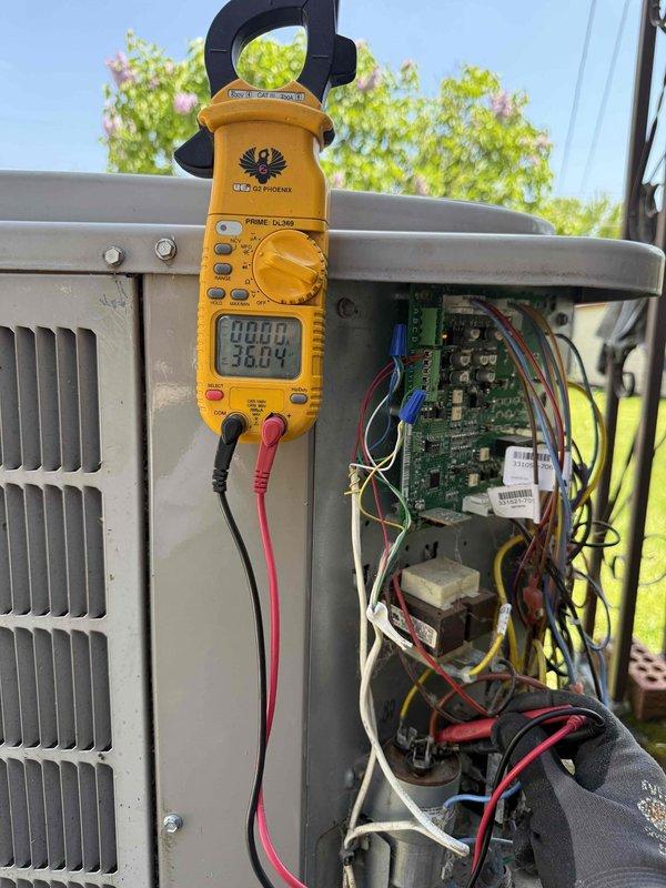 Completed prepaid maintenance inspection on a 15-year-old single-unit HVAC system with outdoor condenser and basement air handler configuration. Performed comprehensive system evaluation including visual inspection of condenser unit exterior, verified heat exchanger fins were clean and free of debris, and conducted electrical diagnostics using clamp meter to measure voltage and amperage readings. Equipment was found operational at time of service, and all measurements were within acceptable parameters for continued system operation.