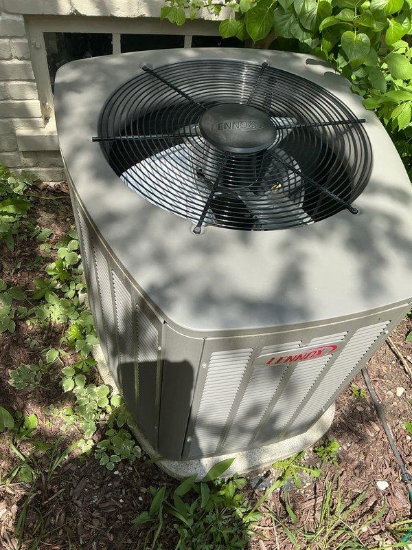 Completed comprehensive seasonal cooling maintenance and tune-up on 9-year-old Bryant residential air conditioning system. Performed full system inspection including condenser unit evaluation, verified proper operation of Lennox outdoor unit components, checked fan motor assembly and protective grille condition, inspected electrical connections, measured refrigerant levels and pressures, cleaned condenser coils, verified adequate airflow through louvers, and confirmed system cycling and temperature differential. All components found operating within manufacturer specifications with no deficiencies noted. System confirmed working properly and ready for cooling season operation.