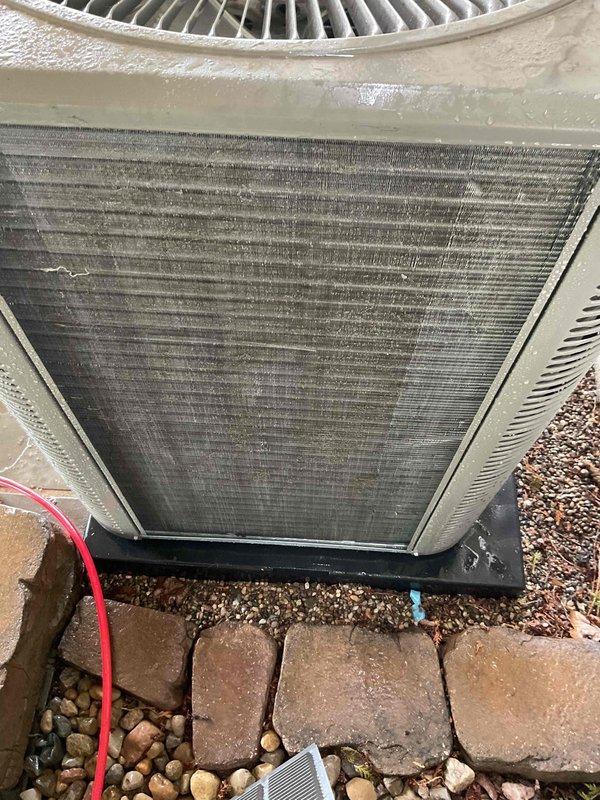 Completed comprehensive Gold AC inspection on single residential unit less than 10 years old with air handler located in attic. Performed thorough examination of outdoor condensing unit, noting significant dirt and debris accumulation on condenser coil fins requiring attention for optimal heat transfer efficiency. Inspected electrical components including capacitor, contactor assembly, and all wiring connections, confirming proper operation and secure terminations. Verified refrigerant lines, fan operation, and overall system functionality. Unit currently operating as designed with no immediate service concerns identified beyond recommended condenser coil cleaning to maintain peak performance.