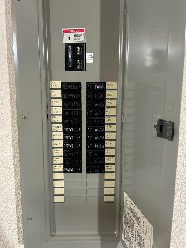 Completed mechanical-only installation of a 90,000 BTU high-efficiency furnace with integrated humidifier system in basement utility area. Connected new unit to existing electrical circuit at breaker panel, verified proper 120V power supply and circuit protection for HVAC equipment. Installed new thermostat, reconnected existing ductwork to furnace plenum, and performed final measurements to ensure proper system configuration and code compliance.