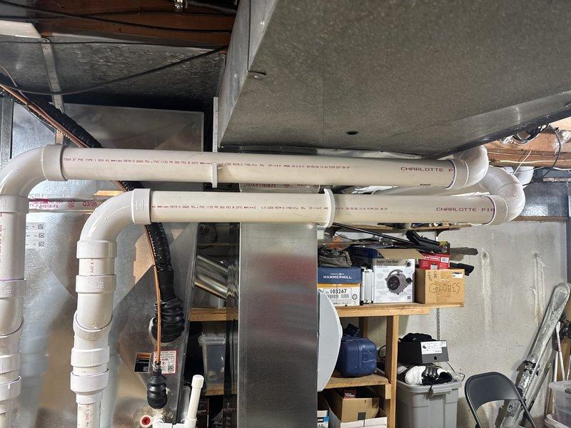 Completed full HVAC system installation including 110,000 BTU Lennox furnace and 4-ton rear-discharge air conditioning unit. Installed new humidifier on return plenum, ran white PVC venting through basement ceiling for high-efficiency furnace exhaust and intake, and coordinated electrical work for new dedicated circuit. Secured mechanical, plumbing, and electrical permits, performed remeasure of supply air ductwork, and documented AHRI certification number for utility rebate qualification with Consumers Energy and DTE.