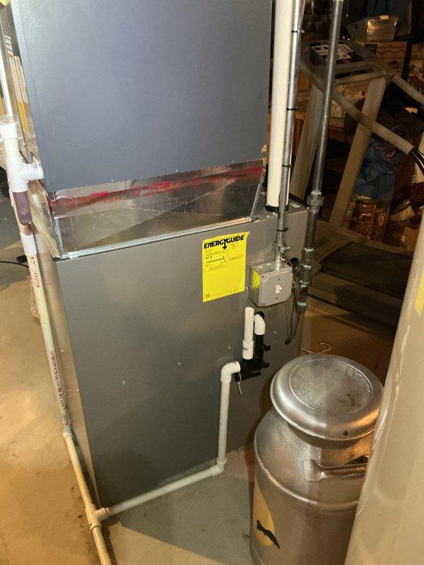 Completed comprehensive Gold AC inspection on 2019 HVAC system with air handler located in basement. Performed full system evaluation including inspection of air handler unit, thermostat functionality verification showing proper temperature reading at 68 degrees, and documentation of equipment condition. All components operating within normal parameters with no immediate service needs identified at time of inspection.