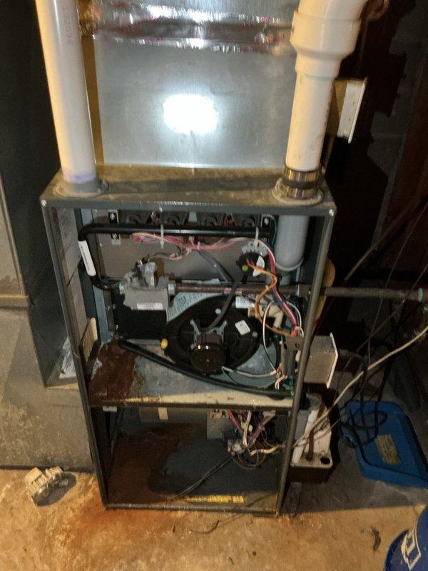 Conducted full system HVAC estimate for residential furnace with failed heat exchanger. Performed comprehensive inspection of existing vertical furnace unit in basement mechanical room, documented internal components including blower assembly and venting configuration, and assessed replacement requirements due to cracked heat exchanger posing safety hazard. Provided detailed quote for complete furnace system replacement with properly sized equipment and necessary modifications to existing ductwork and venting systems.