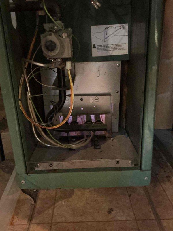 Responded to service call for boiler system experiencing water leak from valve following system drain and refill. Upon inspection, identified leaking valve in the heating system's piping assembly. Performed diagnostic evaluation of the boiler unit and associated hydronic components, including expansion tank and water supply connections. Addressed the valve leak issue, verified system pressure, checked all connections for proper sealing, and confirmed system restored to operational heating capacity with no active leaks present at time of service completion.