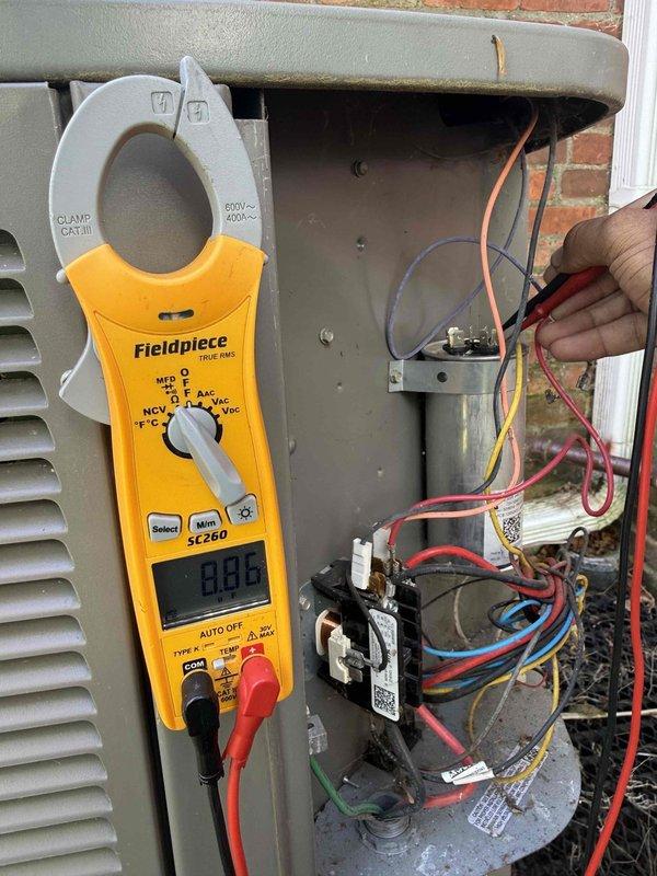 Completed Gold AC inspection and seasonal startup on 10+ year old Lennox condensing unit. Performed comprehensive system diagnostics including electrical measurements with clamp meter, verified capacitor operation, inspected all electrical connections and contactors, and confirmed proper system operation. Unit found in satisfactory working condition with all components functioning within normal parameters.