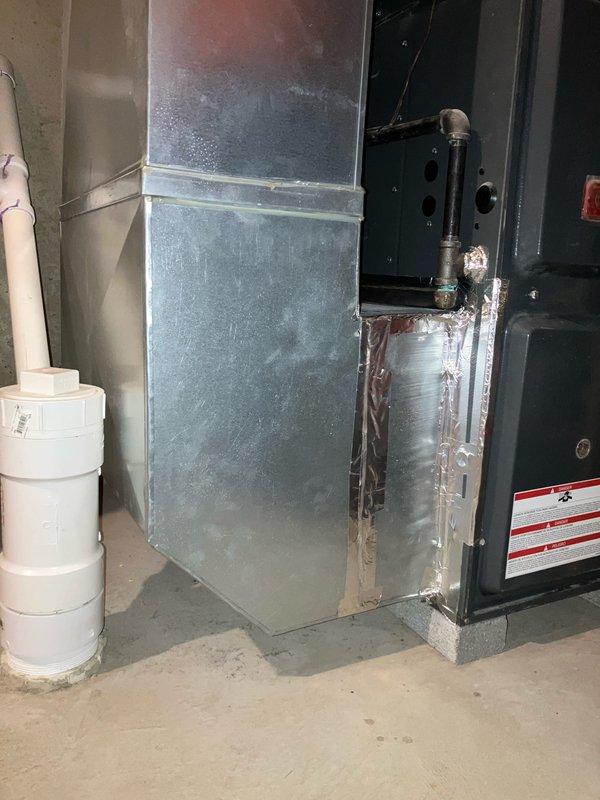 Assessed existing HVAC system in basement where homeowner was using duct tape to seal air filter during changes due to lack of proper filter box. Measured ductwork dimensions and evaluated air handler configuration to determine specifications for installing a permanent filter grille assembly. Provided estimate for proper filter box installation to eliminate need for temporary sealing methods and facilitate routine filter maintenance on the 5-year-old furnace system in this 2021 construction home.